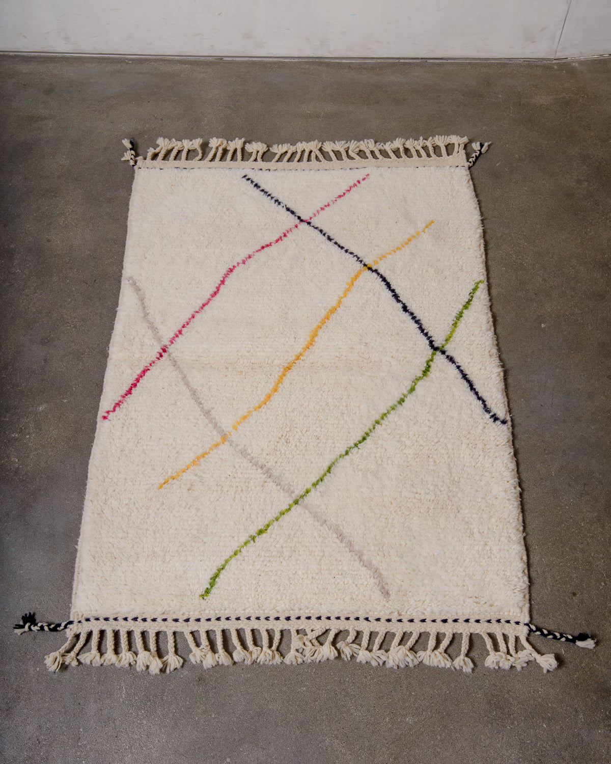 Modern, designer, handcrafted Berber runner rug from Morocco. Beniourain carpet with beautiful colours and patterns and fluffy wool texture.